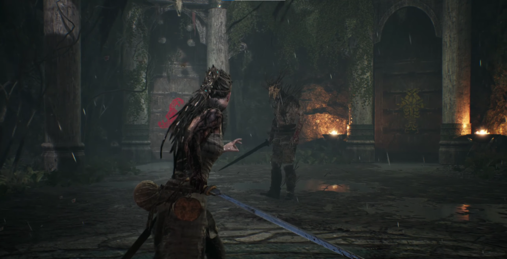 Сенуа с мечом сражается в руинах Hellblade: Senua's Sacrifice