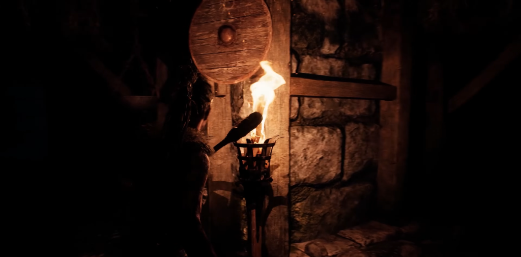 Hands holding tablet showing deceased Anderson Cole profile
