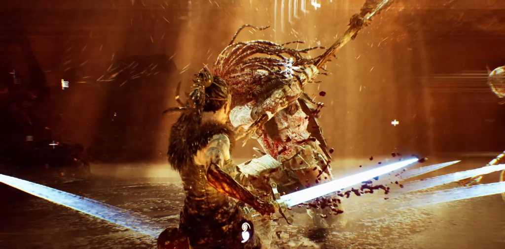 Сенуа сражается мечом с воином в пещере