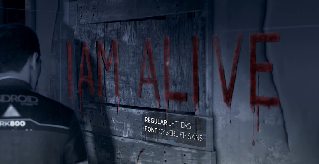 Коннор из Detroit: Become Human смотрит на надпись I AM ALIVE