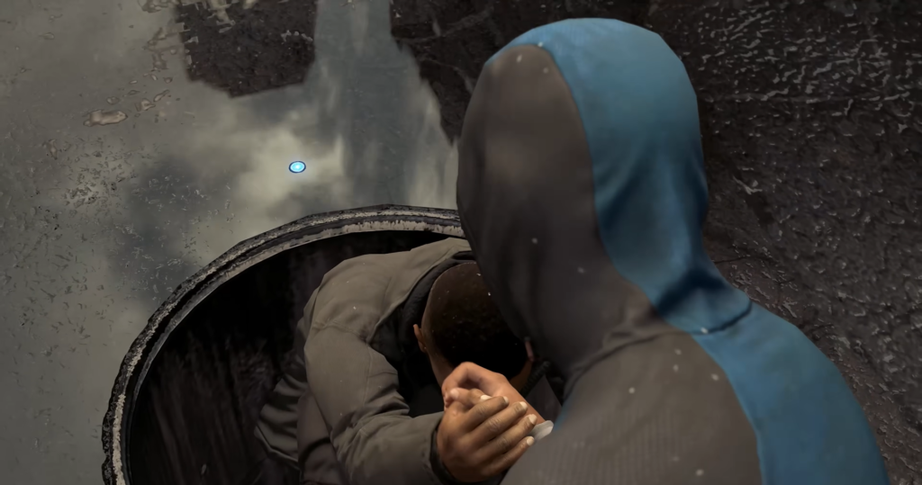 Человек в синей куртке держит другого у люка