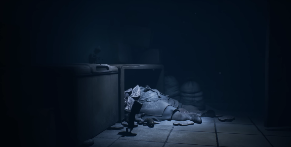 Шестая из Little Nightmares идёт мимо тела в комнате