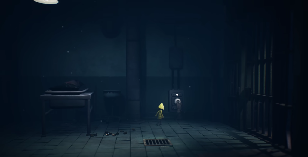 Шестая из Little Nightmares нажимает кнопку в тюрьме