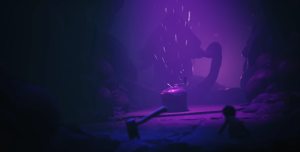 Искры летят над котлом в фиолетовой пещере