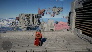 Воин в красном плаще стоит на платформе руин