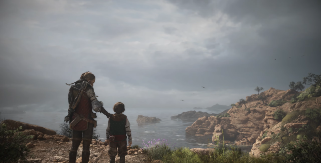 Амиция и Гуго смотрят на море у скал