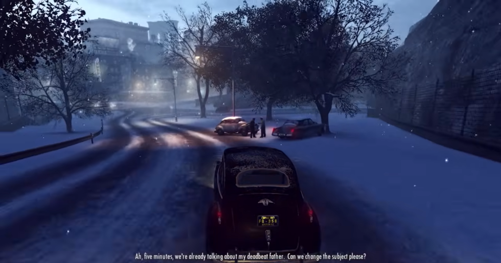 Автомобиль едет по заснеженной дороге ночью в Mafia II