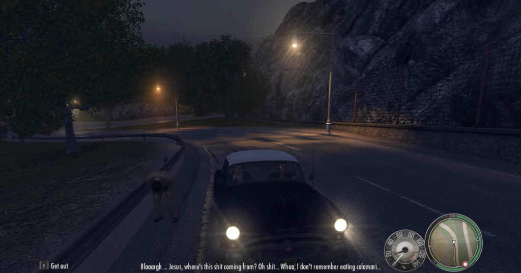 Автомобиль едет ночью по дороге у скалы Mafia II