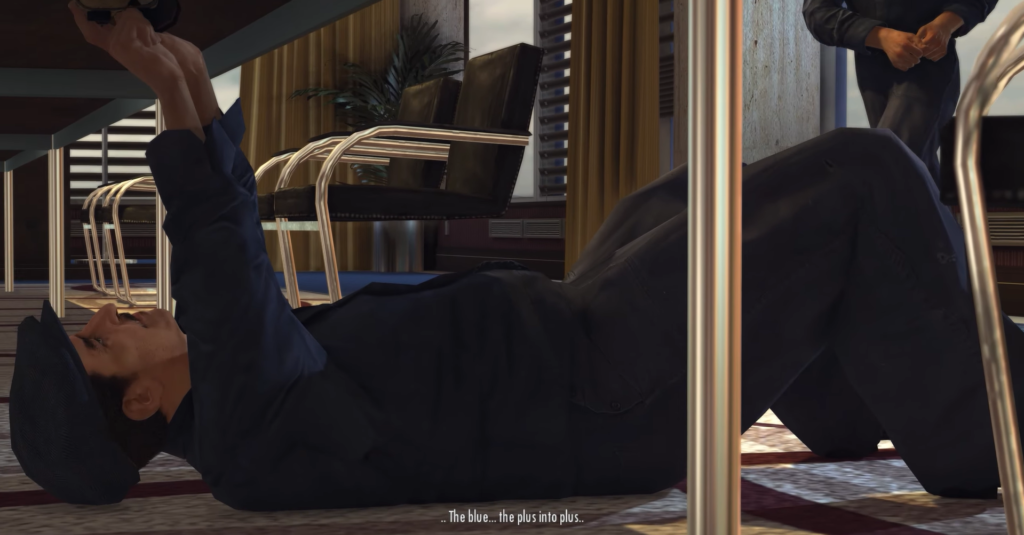 Мужчина в костюме лежит на полу офиса