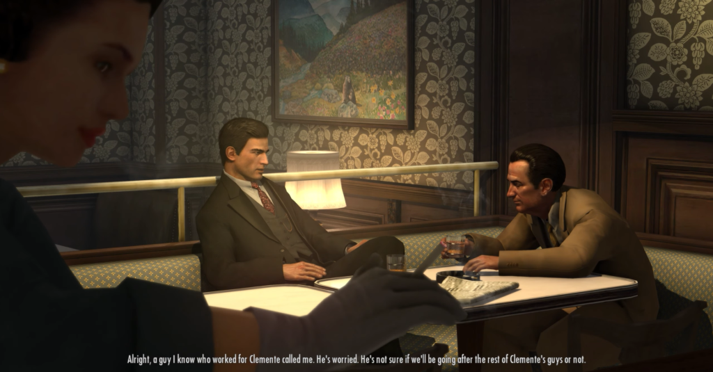 Томми Анджело и Полли обсуждают за столом в баре Mafia