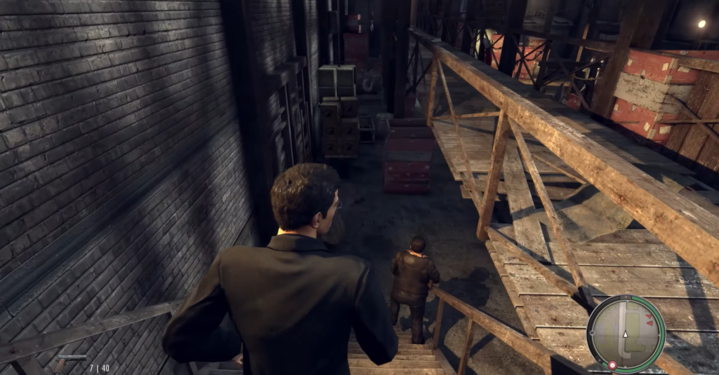 Вито Скалетта из Mafia II спускается по лестнице склада