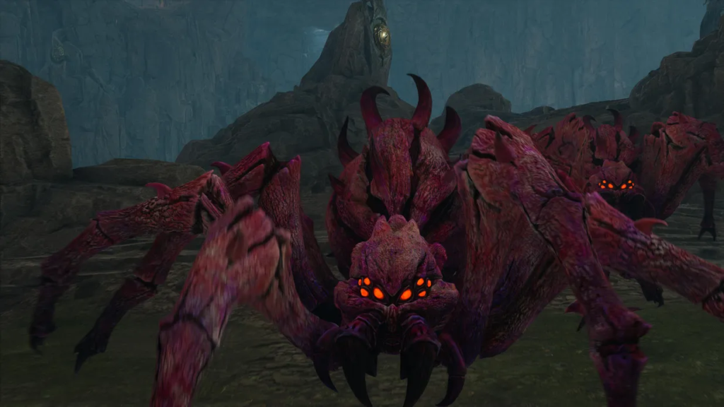 Красный паук с оранжевыми глазами в пещере