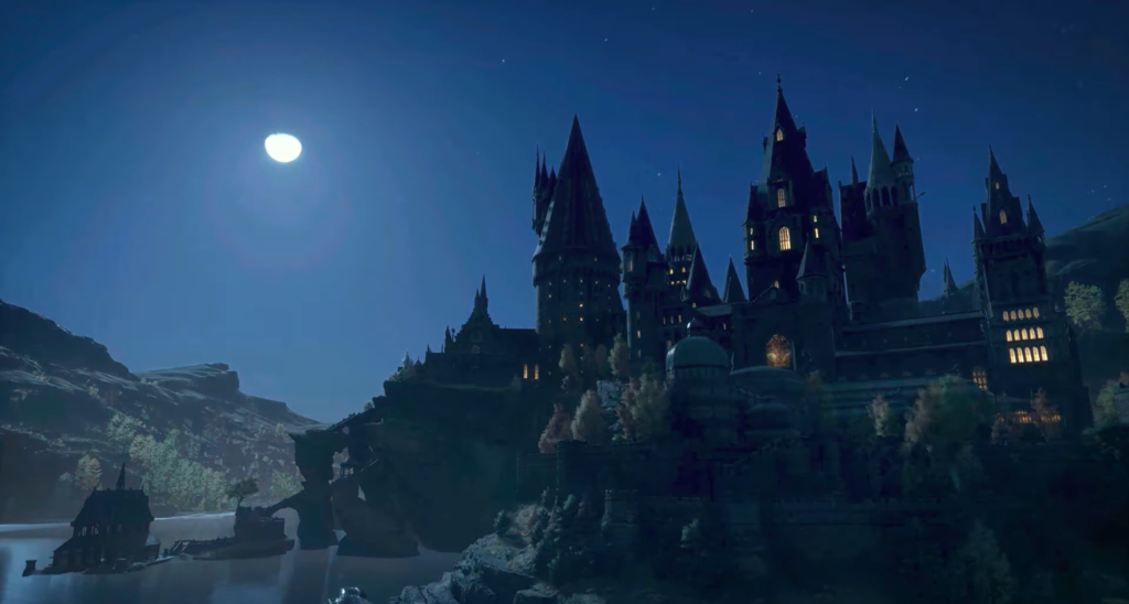 Замок Хогвартс ночью под луной на скале