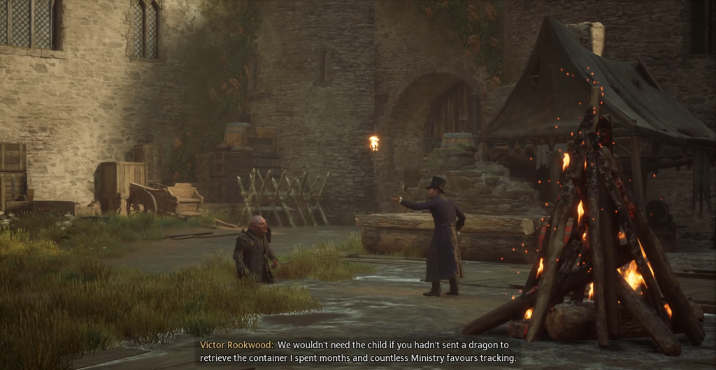 Виктор Руквуд разговаривает у костра во дворе замка