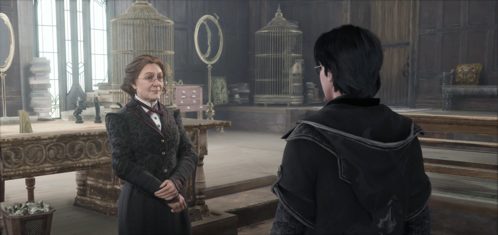 Профессор Уизли разговаривает со студентом в кабинете Hogwarts Legacy