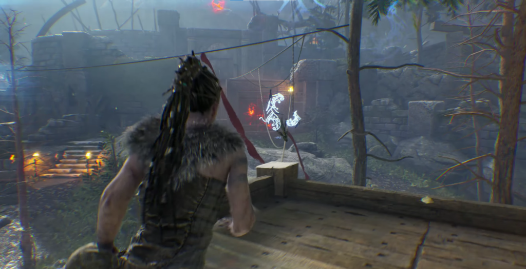 Сенуа из Hellblade целится в руны у руин