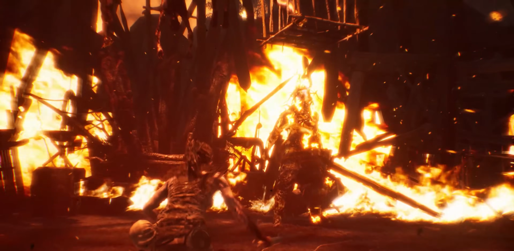 Воин сражается с горящим врагом среди огня