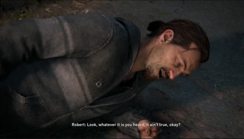 Мужчина лежит на земле и говорит ночью