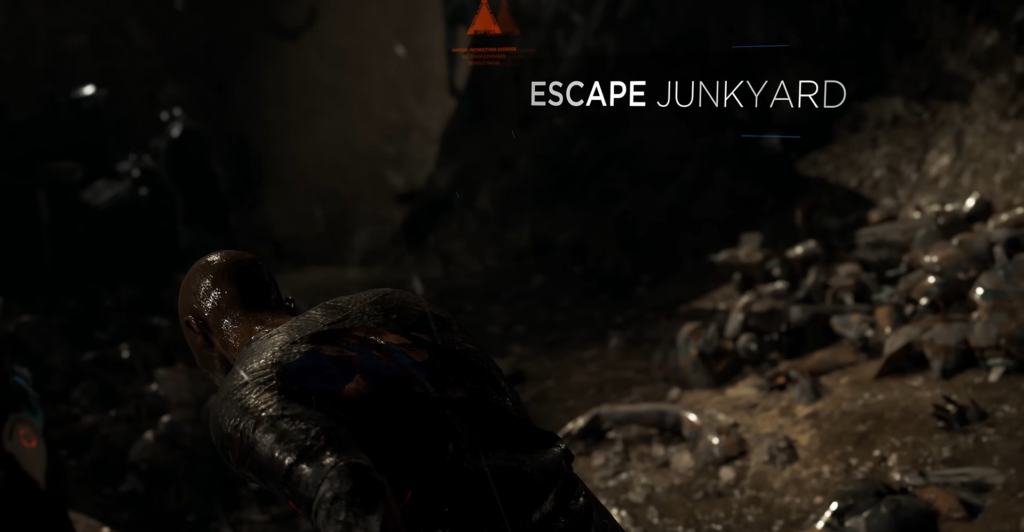 Лысый мужчина ползет по свалке роботов в игре