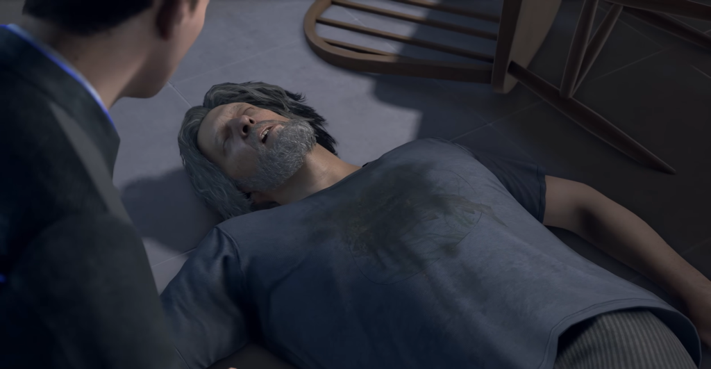 Седой мужчина лежит на полу рядом со стулом