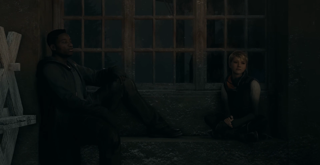 Двое сидят у окна в темной комнате