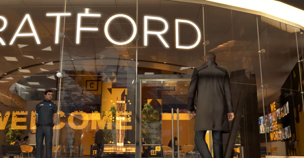 Мужчина входит в стеклянный офис Stratford Tower