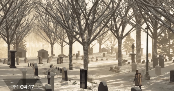 Мужчина идет по заснеженному кладбищу среди деревьев