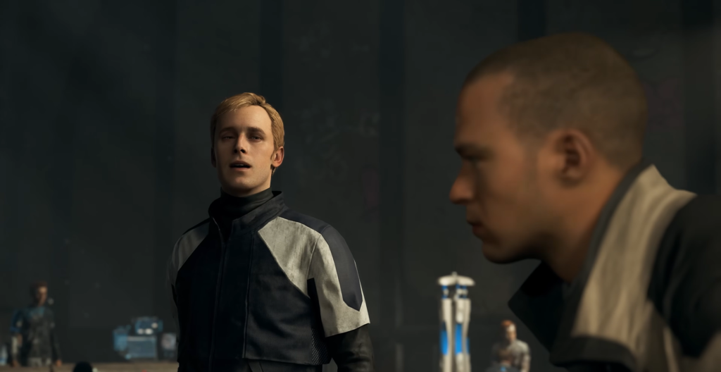 Два мужчины разговаривают в темном помещении