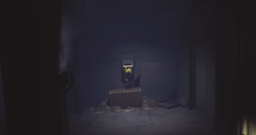 Шестая из Little Nightmares тянет рычаг в комнате