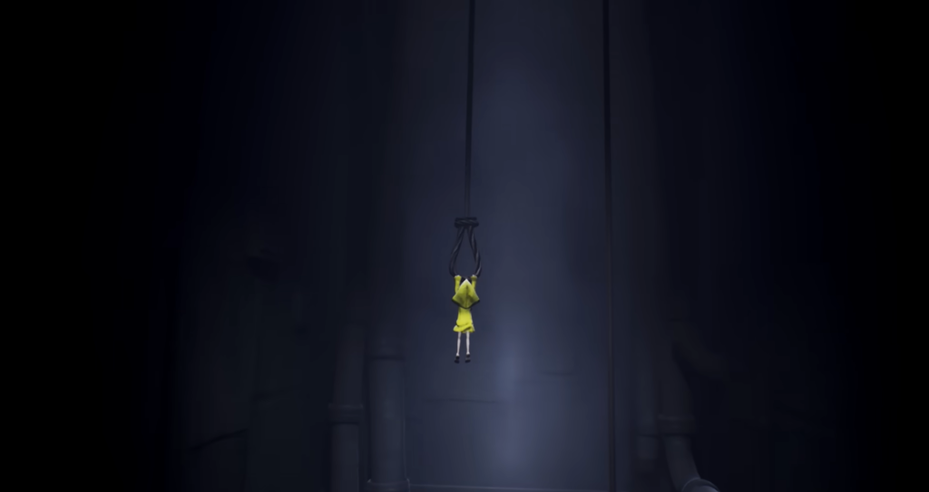 Шестая из Little Nightmares висит на верёвке в шахте