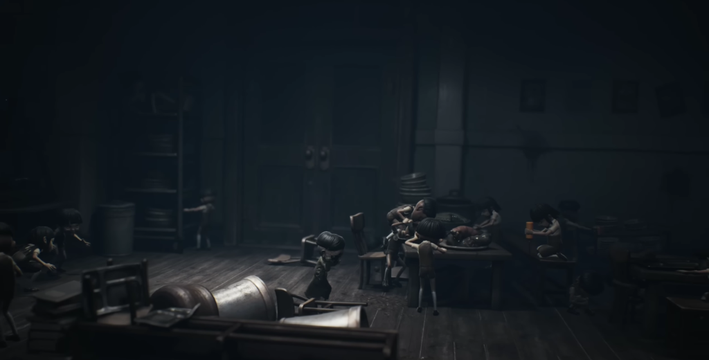 Дети спят за столом в темной комнате