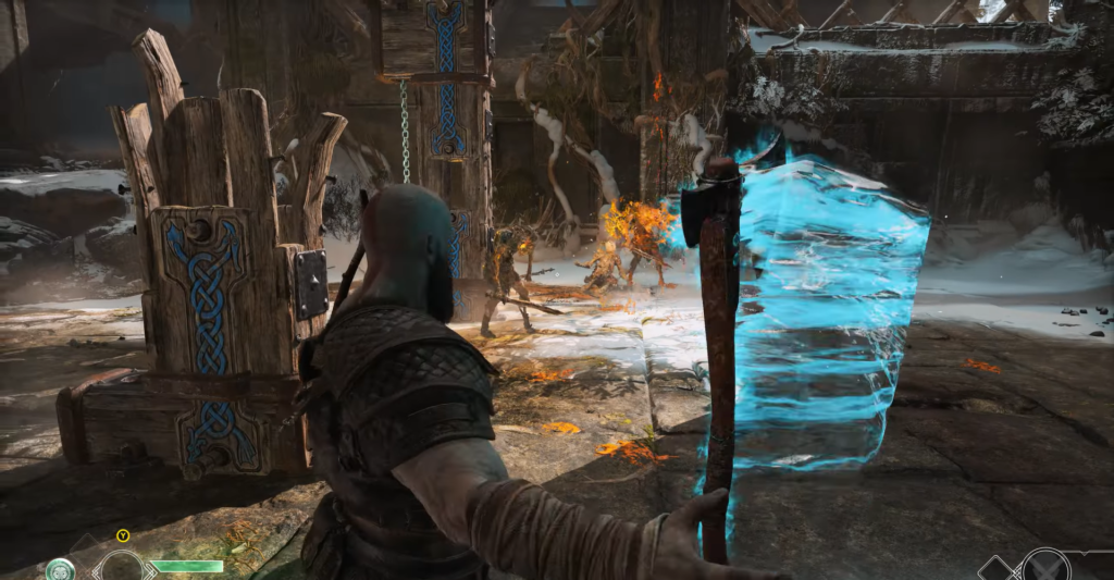 Кратос из God of War сражается в снежных руинах