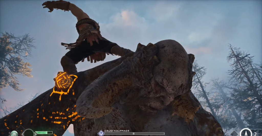 Кратос из God of War сражается с троллем в лесу