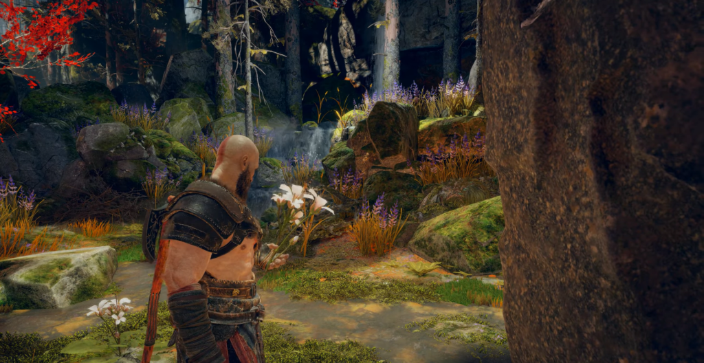 First-person aiming pistol inside red and white corridor