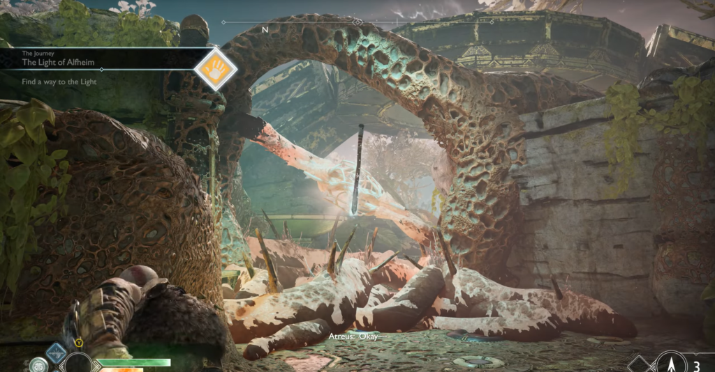 Two survivors watch ruined city skyline at sunset