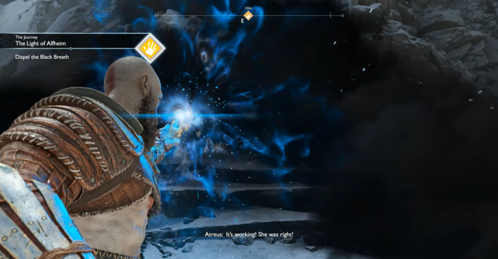 Yellow scooter parked in scrapyard with stacked cars