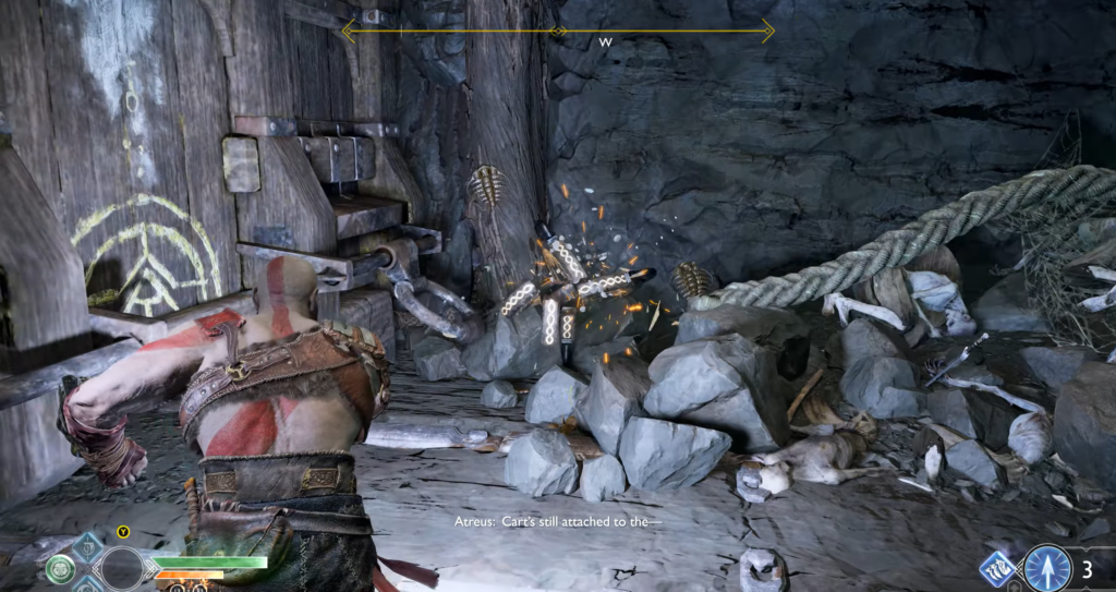 Кратос атакует цепь у скалы в God of War