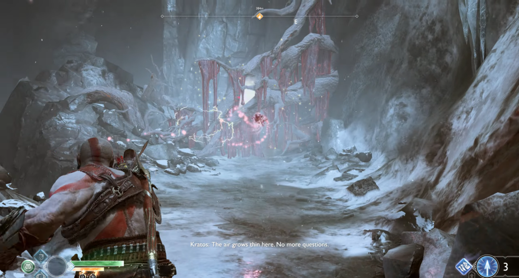 Кратос идет по снежному ущелью в God of War