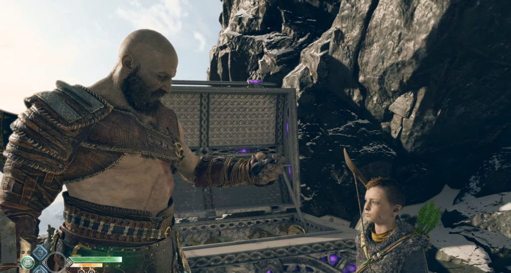 Кратос и Атрей открывают сундук у скал