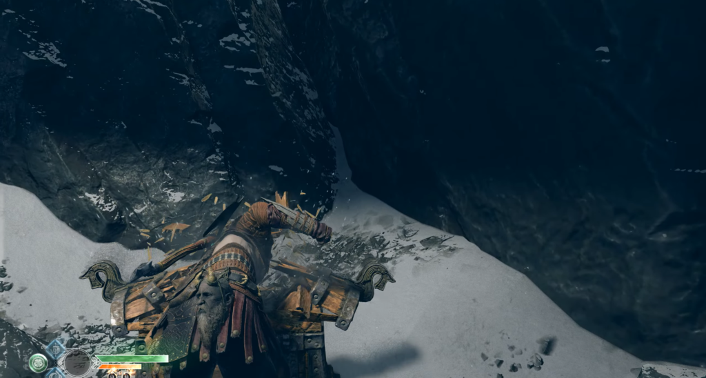 Кратос из God of War ломает сундук в снегу