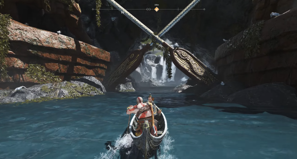 Кратос и Атрей плывут на лодке к водопаду
