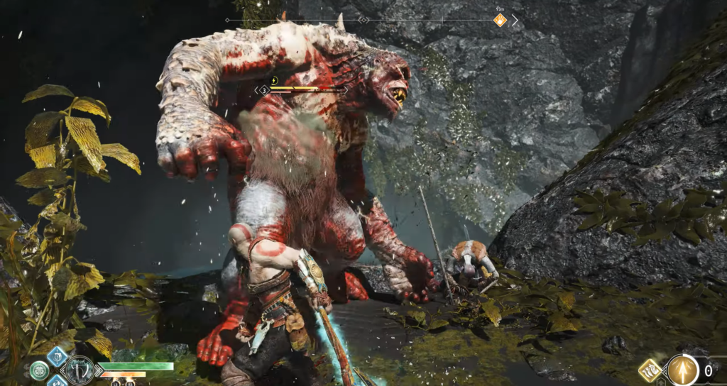 Кратос сражается с троллем в скалистой пещере