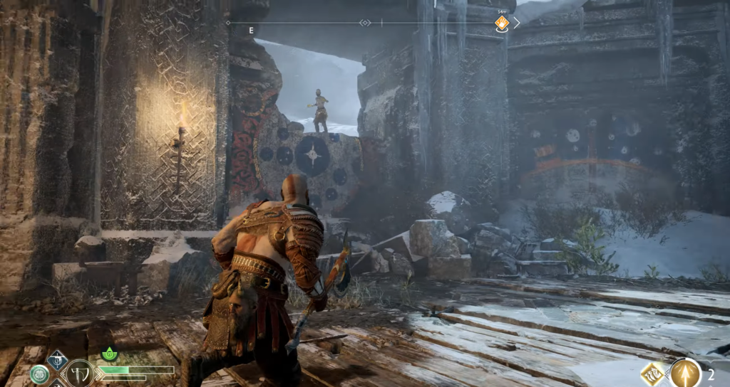 Кратос с топором в снежных руинах God of War