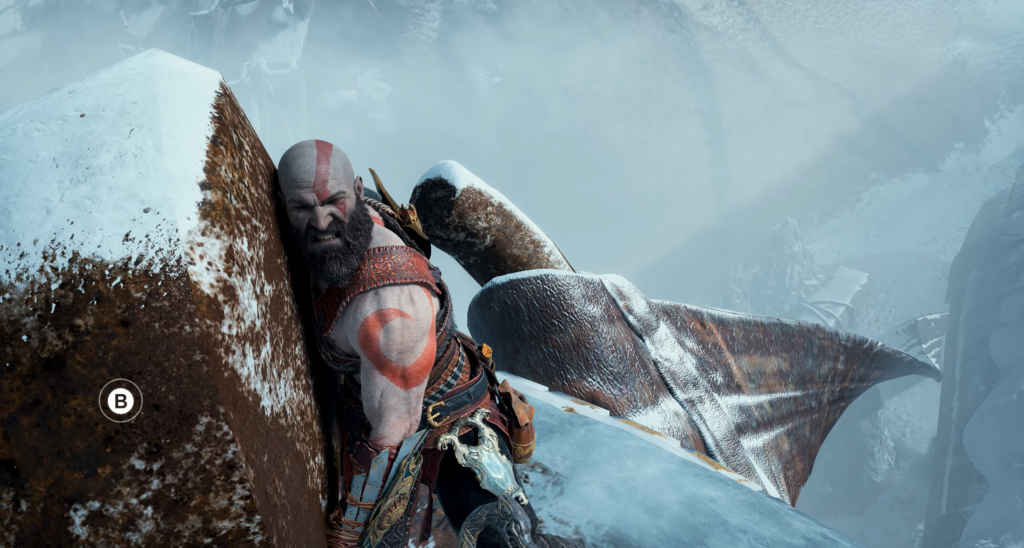 Кратос из God of War толкает камень в снегу