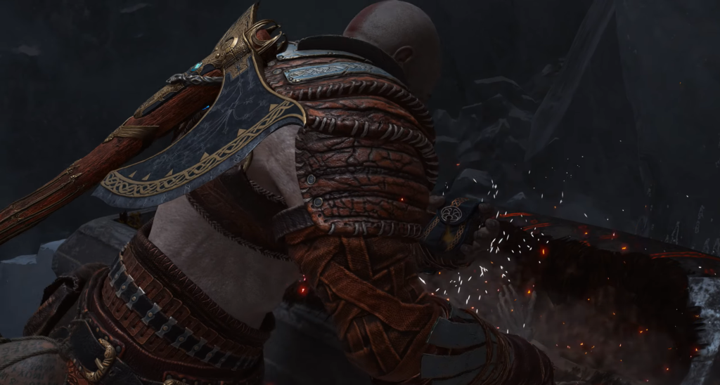 Кратос из God of War сражается в пещере