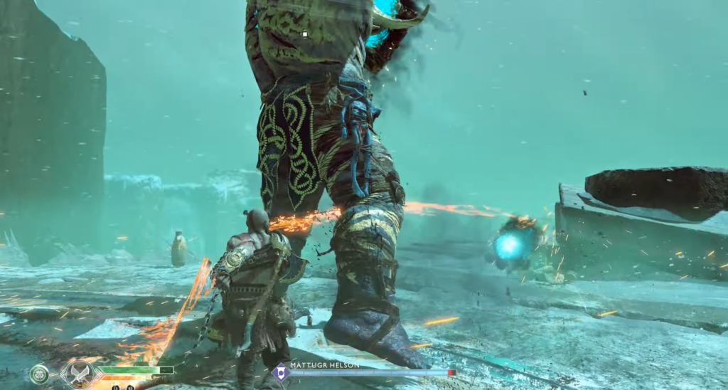 Кратос сражается с великаном в God of War