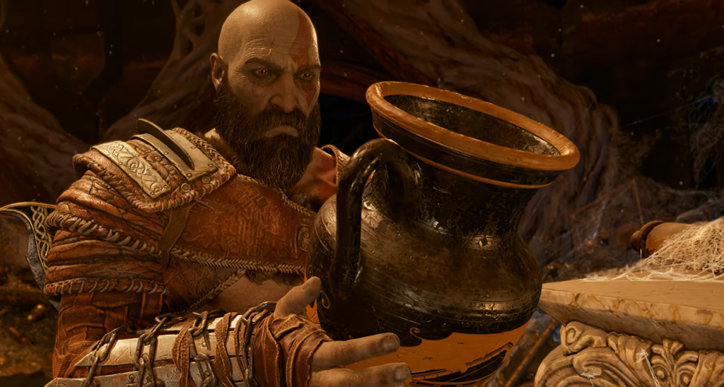 Кратос из God of War держит кувшин в пещере
