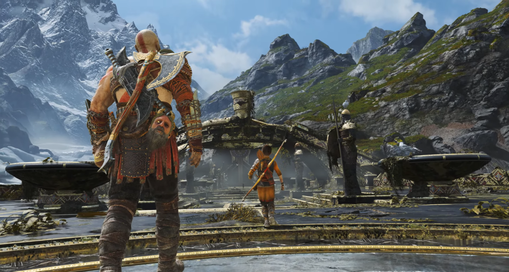 Кратос и Атрей идут к храму в горах God of War