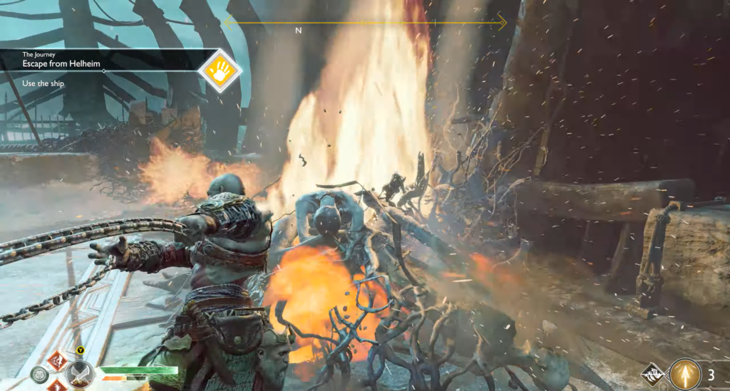 Кратос сражается у огня в God of War