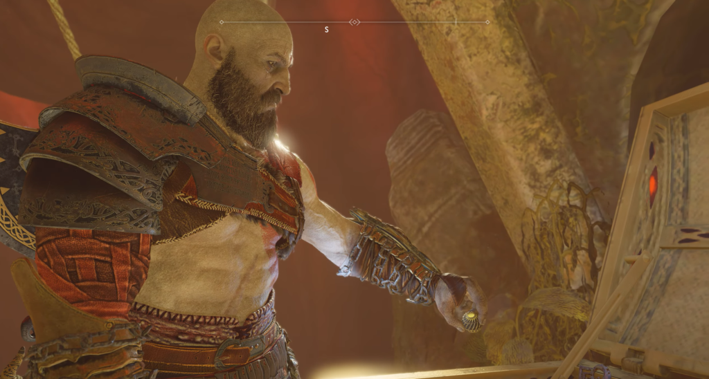 Кратос из God of War открывает сундук в пещере